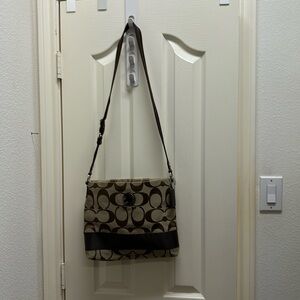 Brown crossbody Coach handbag